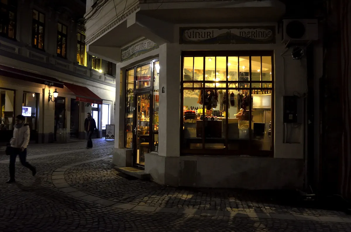 A quiet Old Town corner at night, a block away from the busy streets